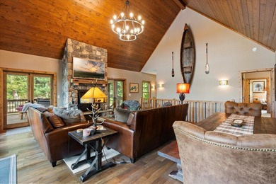 Discover an extraordinary lakefront estate on prestigious - photo 10