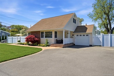 Set in the heart of West Islip, this beautifully updated - photo 1