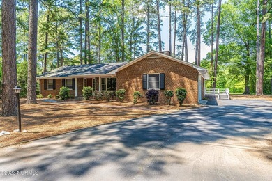 This beautiful, renovated ranch home is ideally situated on the - photo 1