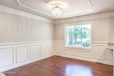 This beautiful, renovated ranch home is ideally situated on the - photo 6