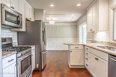 This beautiful, renovated ranch home is ideally situated on the - photo 8