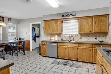 Welcome to this well-maintained 4-bedroom, 2-bath home in the - photo 13