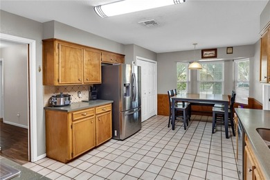 Welcome to this well-maintained 4-bedroom, 2-bath home in the - photo 14