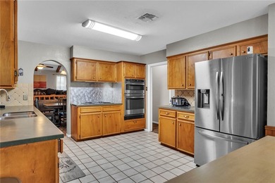 Welcome to this well-maintained 4-bedroom, 2-bath home in the - photo 15
