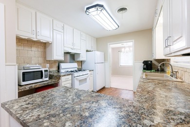 Welcome to 3816 53rd Street, a spacious 4-bedroom, 3-bath home