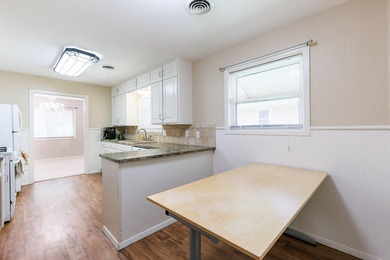 Welcome to 3816 53rd Street, a spacious 4-bedroom, 3-bath home