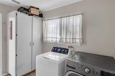 Welcome to this well-maintained 4-bedroom, 2-bath home in the - photo 32