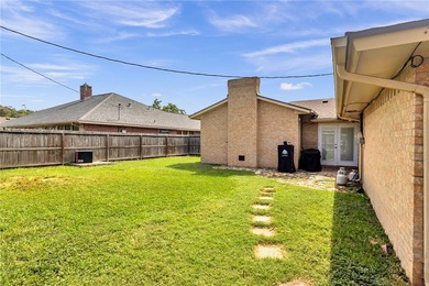 Welcome to this well-maintained 4-bedroom, 2-bath home in the - photo 35