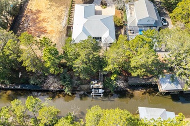 Enjoy canal-front living in this 3BR/3BA home located in - photo 5