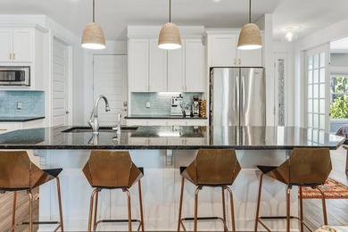 Enjoy canal-front living in this 3BR/3BA home located in - photo 8
