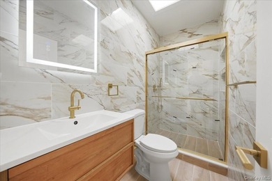 Fully renovated legal 2-family home in the Westchester Square - photo 10