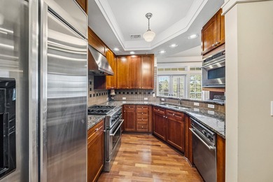 This top-floor corner unit, 3-bedroom 3-bath condo in Lakeside - photo 7