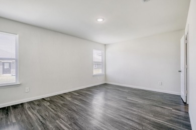 Welcome home to this charming 3-bedroom, 2 bath brick home - photo 3
