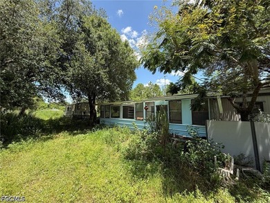 This property has a structure on its land in unknown condition - photo 13