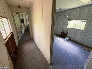 This property has a structure on its land in unknown condition - photo 15