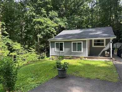 Escape to the peace and privacy of this charming 2-bedroom - photo 1