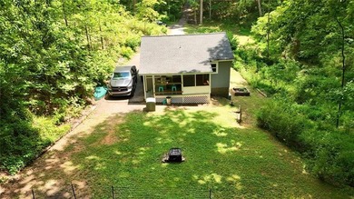 Escape to the peace and privacy of this charming 2-bedroom - photo 2