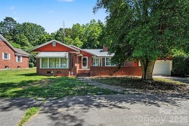 Discover the lasting value of this 3BD/3BA brick home on a rare - photo 1