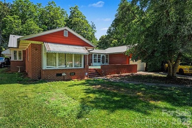 Discover the lasting value of this 3BD/3BA brick home on a rare - photo 2
