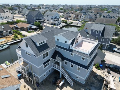 Exceptional new construction waterfront home in Normandy Beach - photo 16