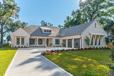Set beneath a canopy of majestic and historic live oak trees and - photo 1