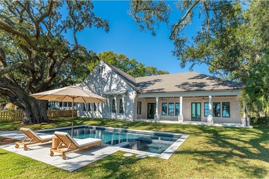 Set beneath a canopy of majestic and historic live oak trees and - photo 8