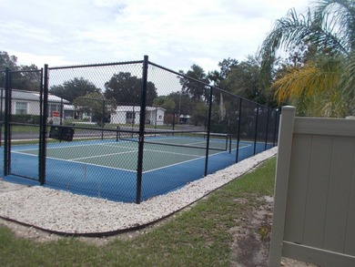 WELCOME TO THIS CHARMING HOME NESTLED IN A DESIRABLE 55+ - photo 11
