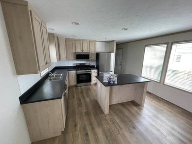 Welcome to this beautifully crafted 3-bedroom, 2-bath home at - photo 1