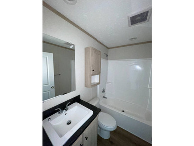 Welcome to this beautifully crafted 3-bedroom, 2-bath home at - photo 8