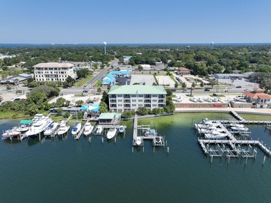 Discover coastal elegance in this stunning harbor-front condo - photo 1