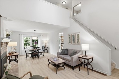 Welcome to this sparkling, move-in ready end-unit townhome in - photo 3