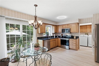 Welcome to this sparkling, move-in ready end-unit townhome in - photo 6