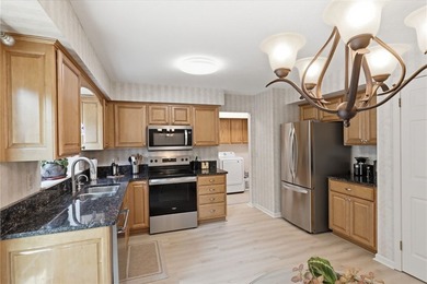 Welcome to this sparkling, move-in ready end-unit townhome in - photo 7