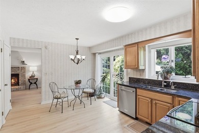 Welcome to this sparkling, move-in ready end-unit townhome in - photo 9