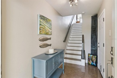 Set within a gated, waterfront community in Oldsmar, this - photo 3