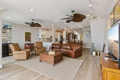 Set within a gated, waterfront community in Oldsmar, this - photo 4