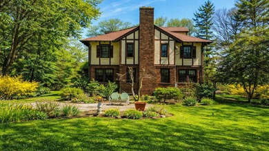 Welcome to a rare and enchanting property in the prestigious - photo 3
