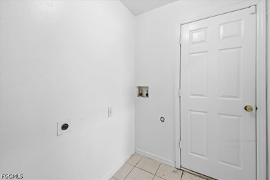 3-bedroom, 2-bath home offering an open-concept layout with tile - photo 25