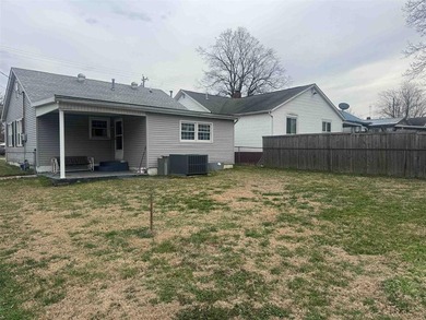 Charming one-level home in Henderson situated on a deep corner