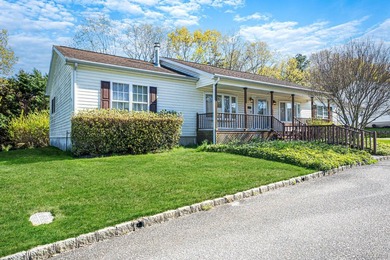 Welcome to unit number 253 here at Foxwood Village in Calverton - photo 3