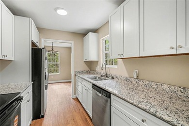 Completely renovated and move-in ready, this 3-bedroom, 2-bath - photo 11