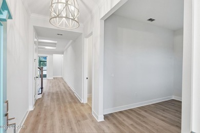 The design of this home showcases classic coastal charm with a - photo 22