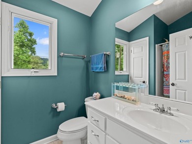 Beautiful lakefront home on a rare level lot with stunning - photo 30