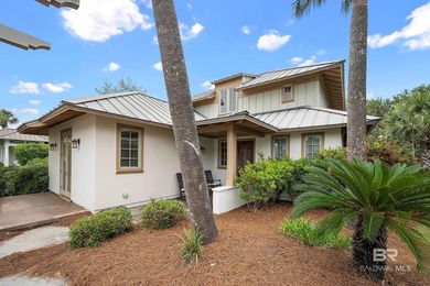 Located in The Beach Club Cottages, this home offers the - photo 1