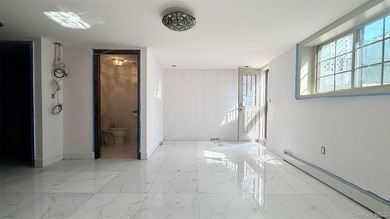 This charming one-family home offers three bedrooms, two and a - photo 18