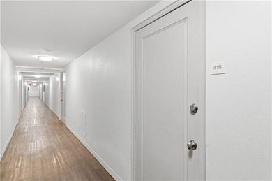 Welcome to luxury living on the avenue! Unit 416 can be an