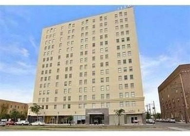 Welcome to luxury living on the avenue! Unit 416 can be an