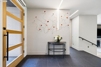 Tucked thoughtfully back from the street, this striking modern - photo 5