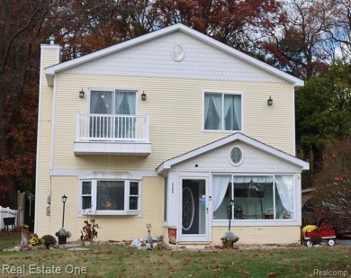 Woodland Lake - Livingston County Home For Sale in Brighton Michigan