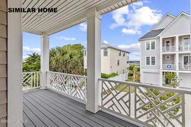 Discover unparalleled coastal living at 607a S Topsail Drive